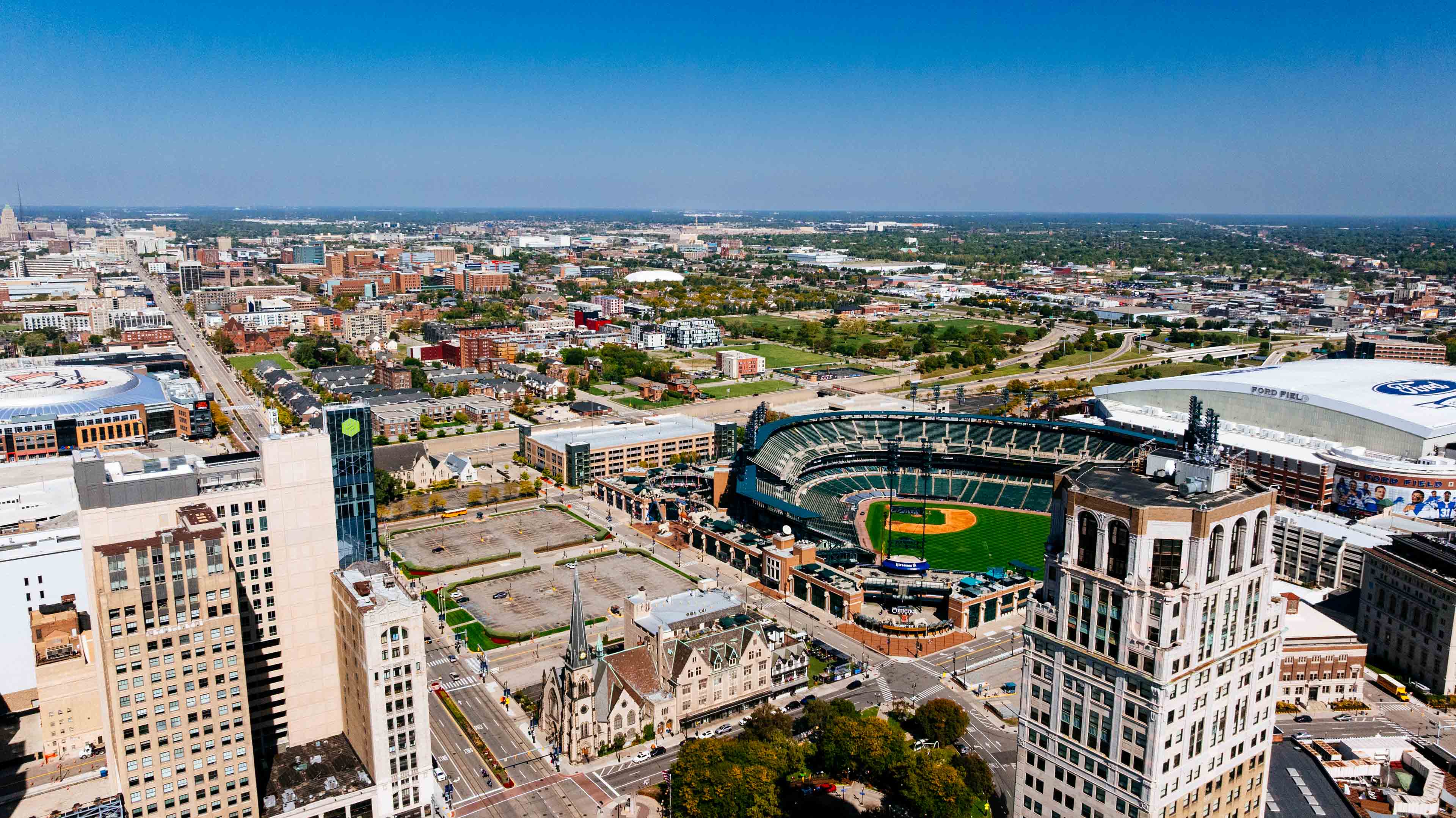 Aerial view of Comerica Park and Ford Field from downtown